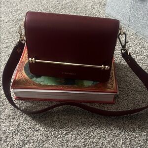 Strathberry Deep Red Crossbody Bag with Gold Accents